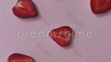 草莓背景运动设计视频.. 生物切片<strong>水果</strong>浆果。 颜色纹理接近。 4k3840x2160